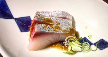 Inside Q Sushi in Downtown Los Angeles Amber jack with onion soy sauce