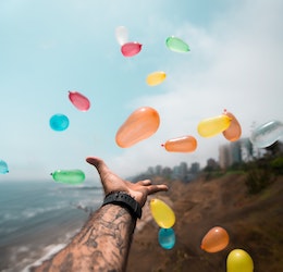 Water balloons photo by Sebastián León Prado via Unsplash