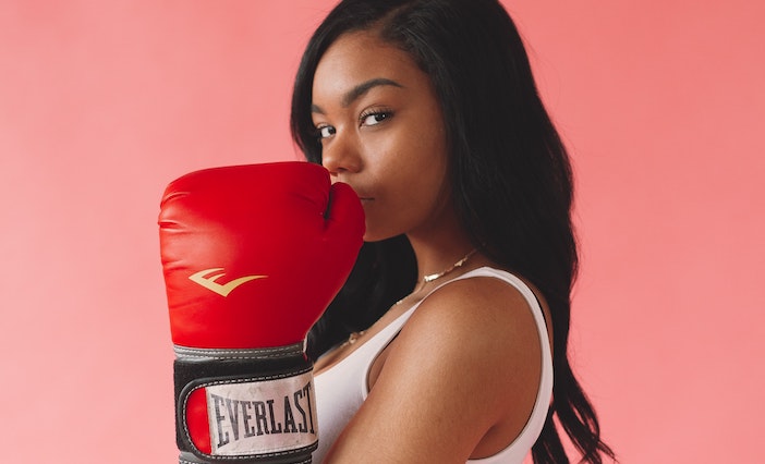 Woman with boxing gloves photo by Jermaine Ulinwa from Pexels