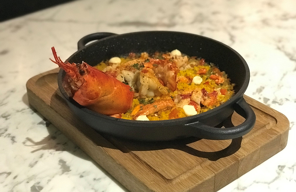 Paella De Bogavante made of Maine lobster paella sofrito photo courtesy Radisson Blu