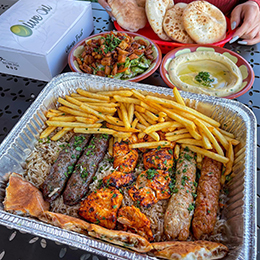 Family tray and other dishes from OlyvOyl photo courtesy OlyvOyl Mediterranean Grill