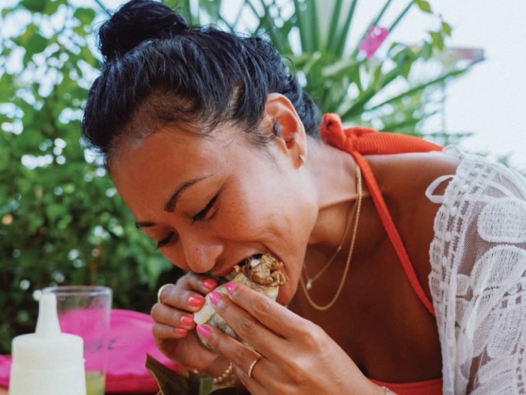 woman eating DineLA Summer 2025