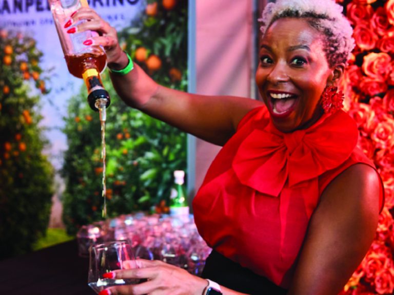 woman pouring a drink at the BeachLife Festival