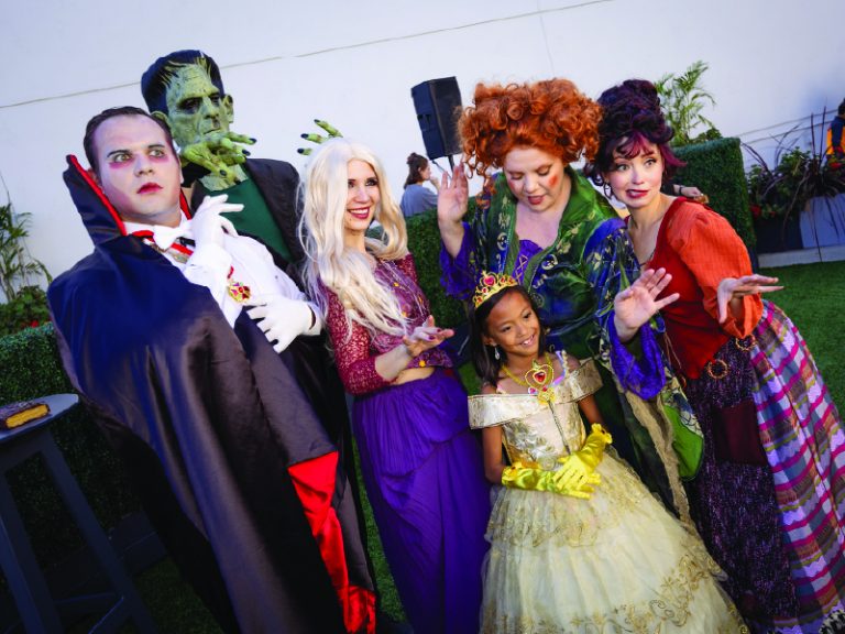 people in costume at the Halloween Spooktacular