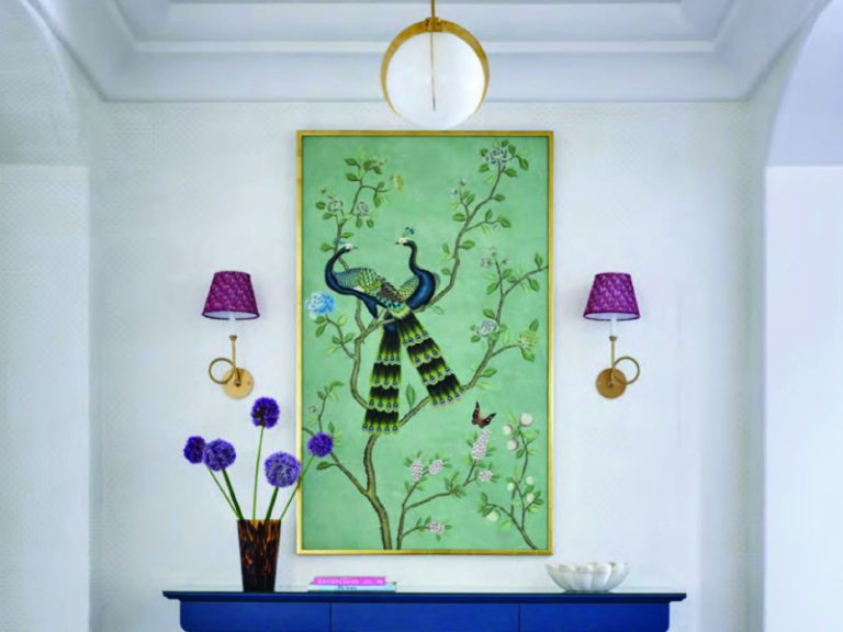 picture of a picture with 2 peacocks